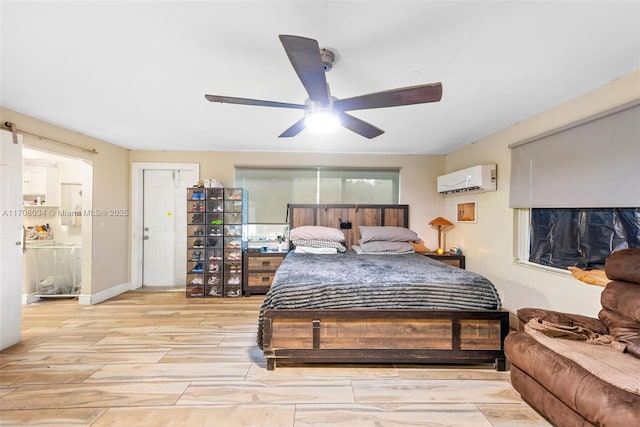 bedroom featuring an AC wall unit, ceiling fan, and light hardwood / wood-style floors