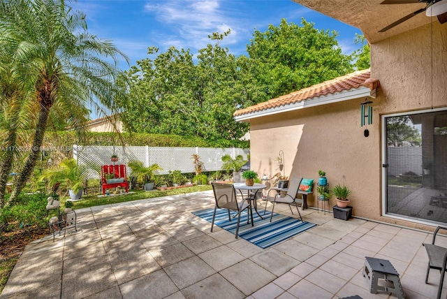 view of patio with ceiling fan