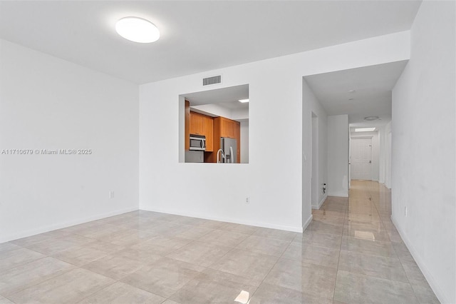 3340 NE 190th St Unit 1206, Aventura, FL 33180 - bathroom featuring a sink, double vanity, visible vents, and tile patterned floors