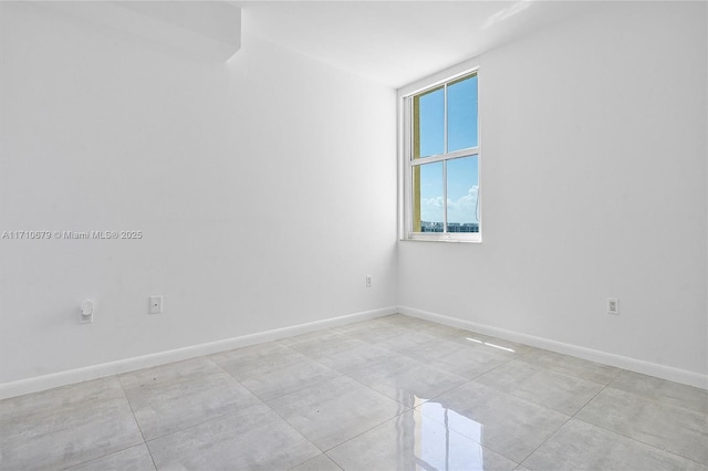3340 NE 190th St Unit 1206, Aventura, FL 33180 - laundry area with washer and clothes dryer, baseboards, and laundry area