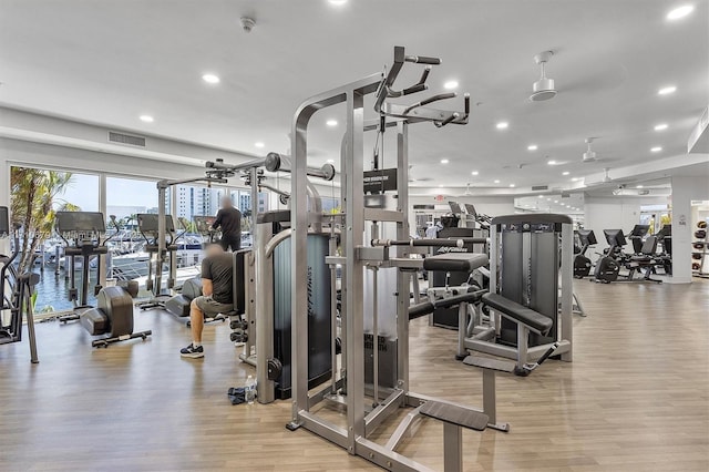 3340 NE 190th St Unit 1206, Aventura, FL 33180 - workout area featuring light wood-style flooring, recessed lighting, and visible vents