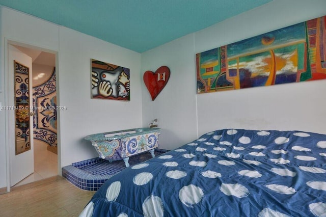 7801 NE 4th Ct Unit 317, Miami, FL 33138 - bedroom featuring wood finished floors