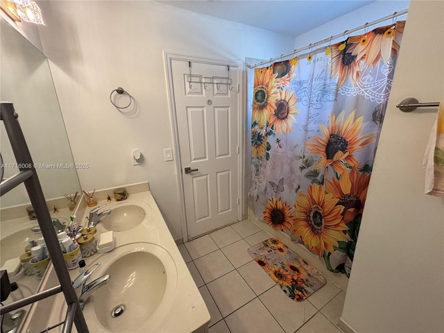 bathroom featuring tile patterned flooring, a shower with shower curtain, and vanity