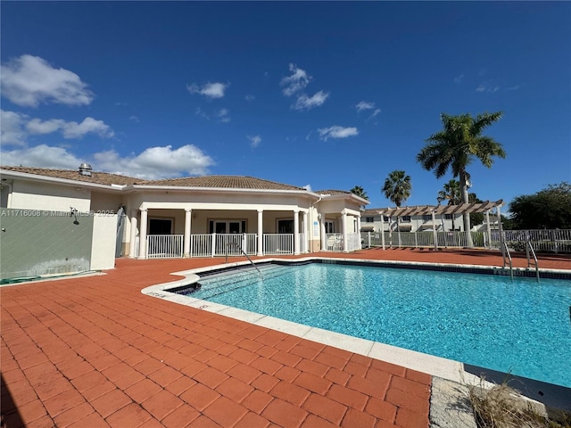 view of pool featuring a patio and a pergola