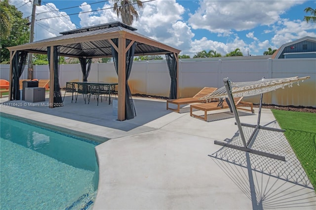 view of pool with a gazebo and a patio