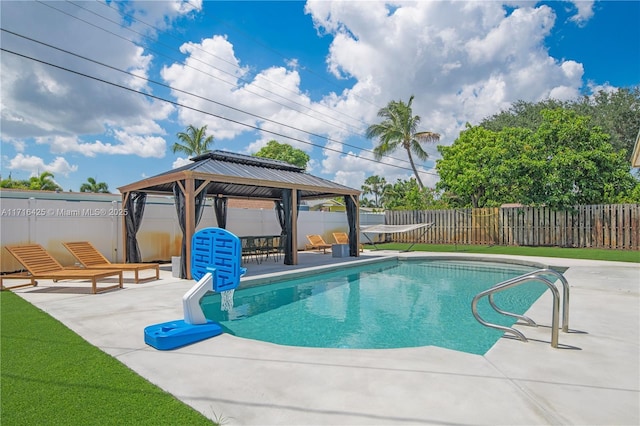 view of swimming pool featuring a gazebo and a patio area