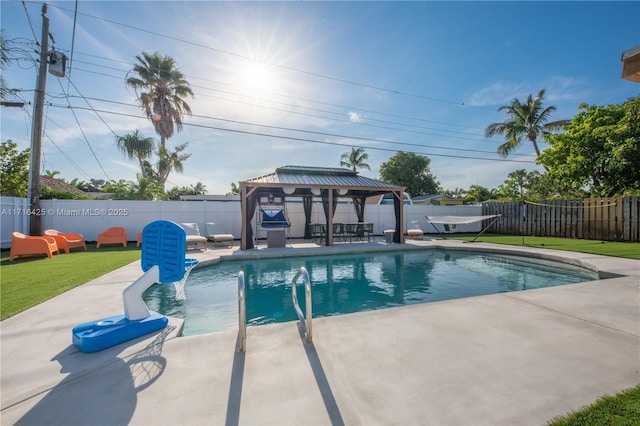 view of pool featuring a gazebo, a yard, and a patio