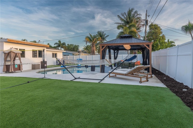 view of pool featuring a gazebo, a patio, and a lawn