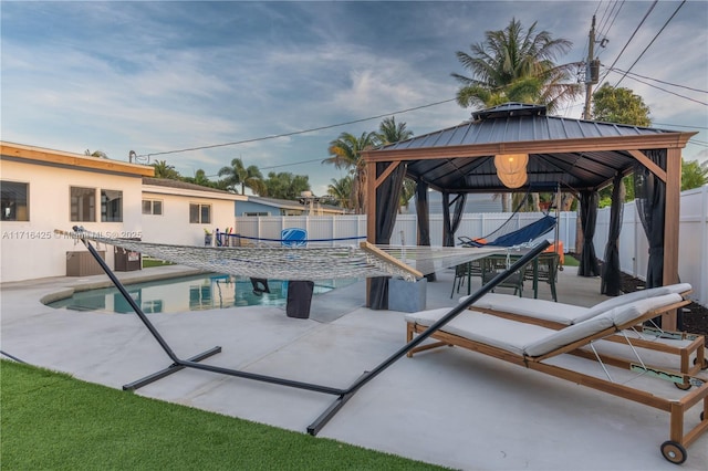 view of swimming pool featuring a gazebo, a patio area, and central AC unit