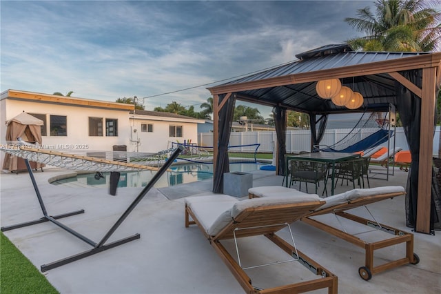 view of pool featuring a gazebo and a patio