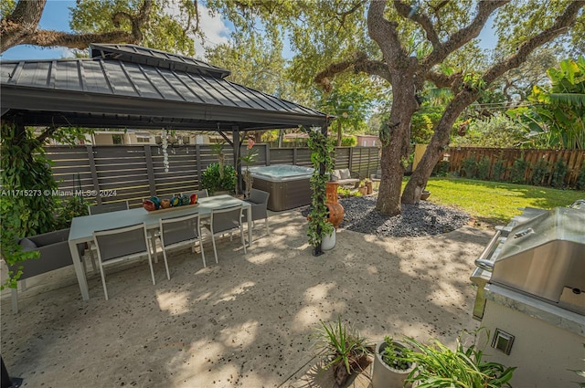 view of yard with a gazebo, a patio, and a hot tub