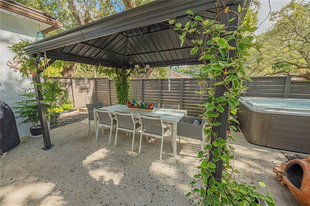 view of patio featuring a hot tub