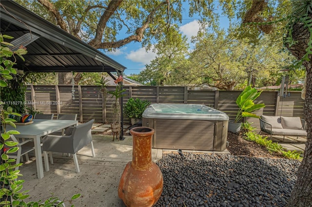 view of patio featuring a hot tub