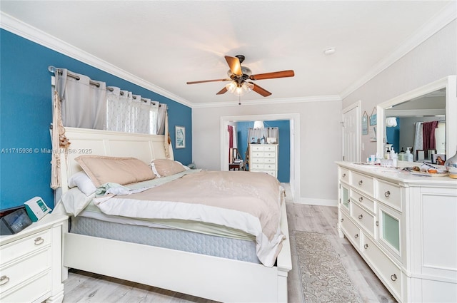 bedroom featuring light hardwood / wood-style floors, ceiling fan, and crown molding