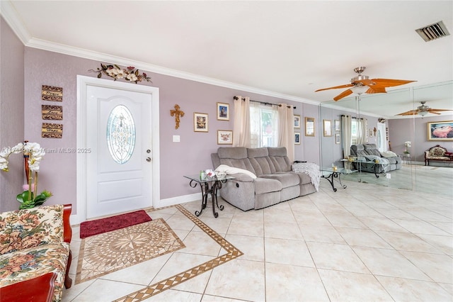 tiled living room with ceiling fan and ornamental molding