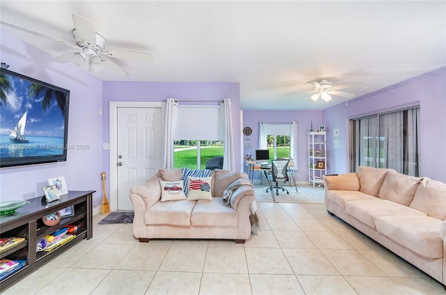 living room featuring ceiling fan and light tile patterned floors