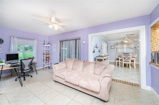 tiled living room featuring ceiling fan and crown molding