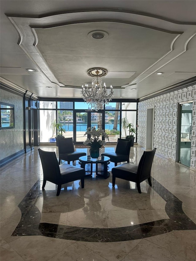 building lobby featuring a water view