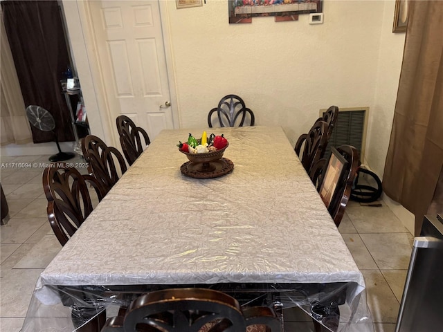 dining room with light tile patterned floors