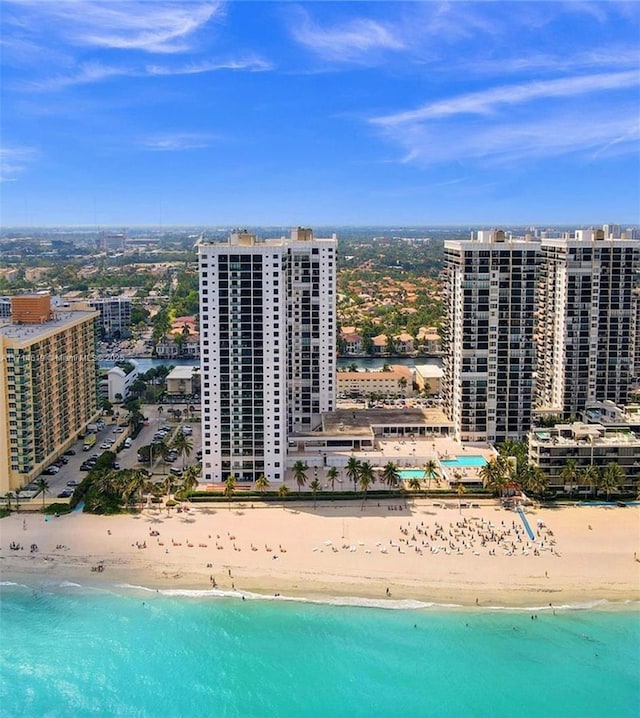 aerial view featuring a beach view and a water view