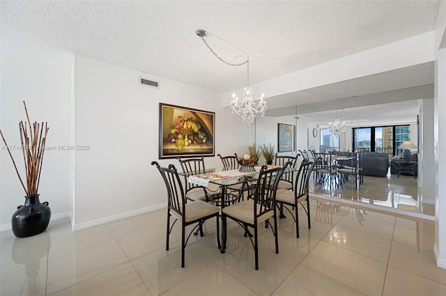 tiled dining room featuring floor to ceiling windows, a chandelier, and a textured ceiling