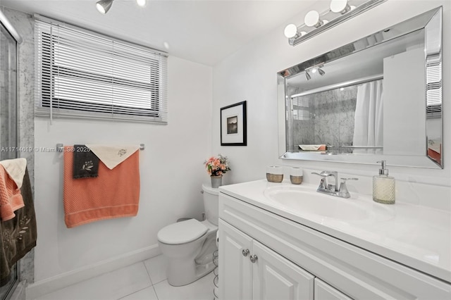 bathroom with toilet, tile patterned flooring, vanity, and walk in shower