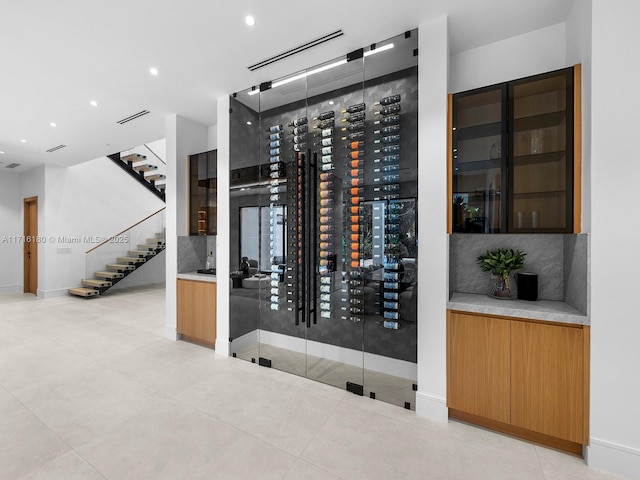 wine room featuring light tile patterned floors