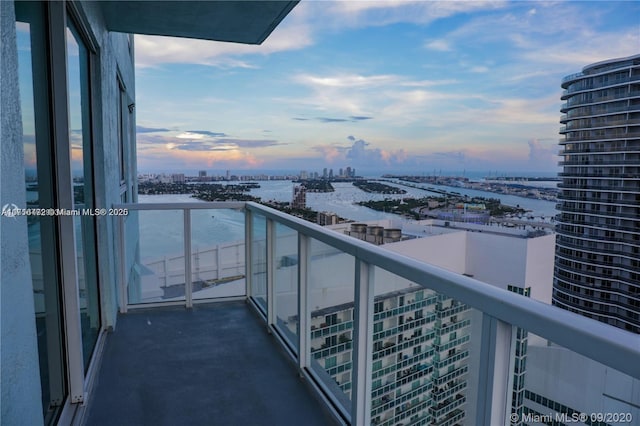 view of balcony at dusk