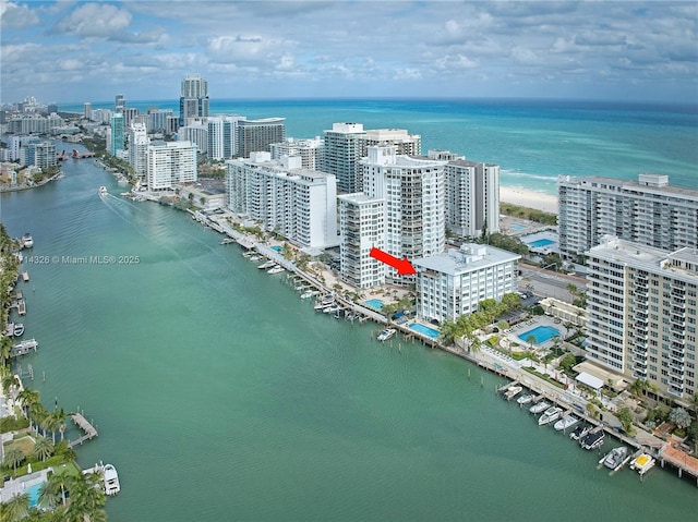 birds eye view of property featuring a water view