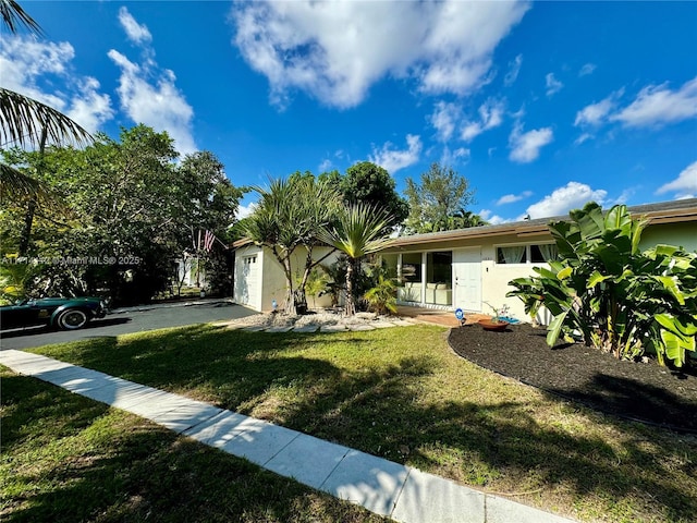 view of front of home with a front yard