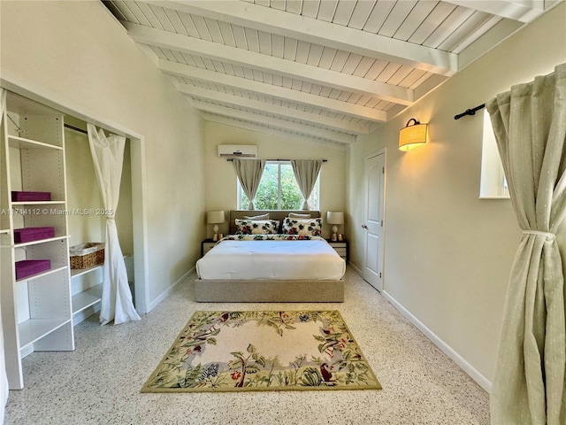 bedroom with lofted ceiling with beams and an AC wall unit