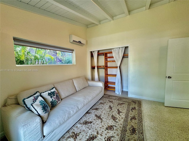 living room with beam ceiling and an AC wall unit