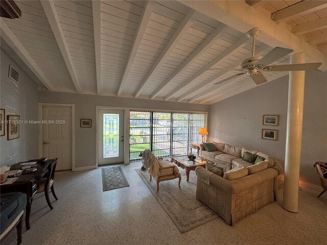 living room with vaulted ceiling with beams and ceiling fan