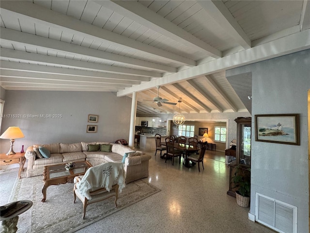 living room with lofted ceiling with beams and ceiling fan