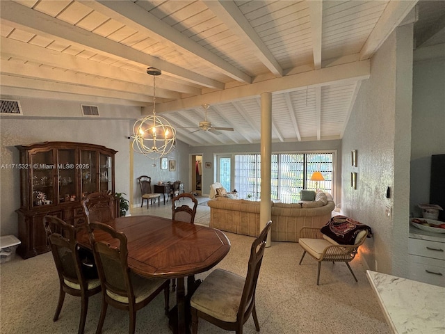 dining room featuring vaulted ceiling with beams and ceiling fan with notable chandelier