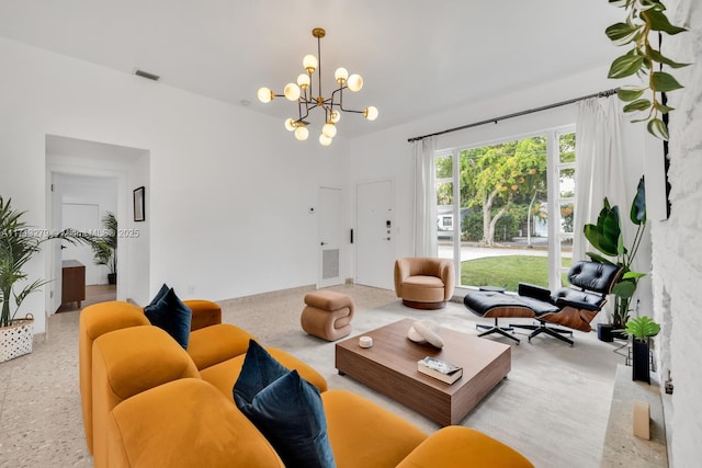 living room with a notable chandelier