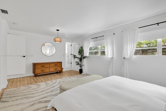 bedroom featuring light hardwood / wood-style flooring