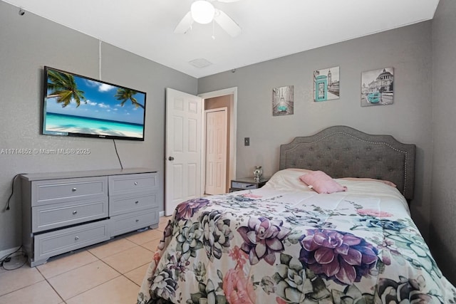 bedroom with light tile patterned flooring and ceiling fan