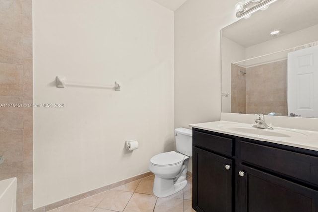 full bath featuring toilet, tile patterned flooring, baseboards, and vanity