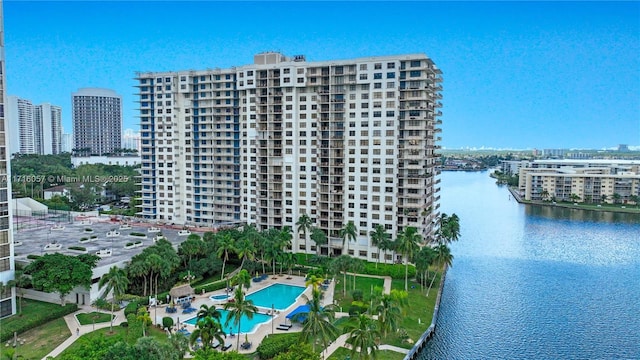 view of building exterior with a water view