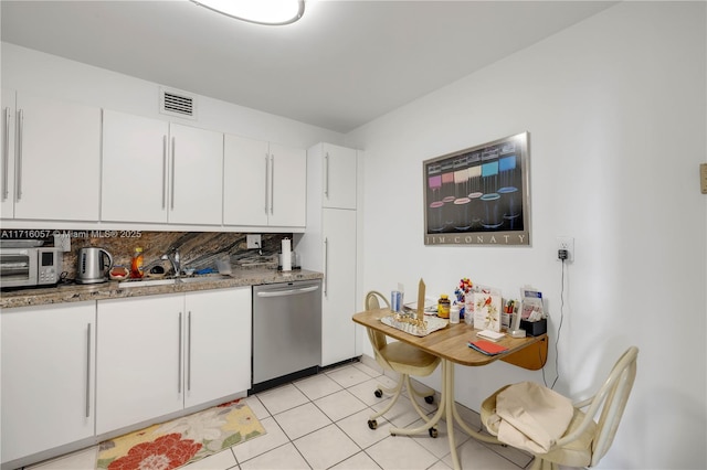 18151 NE 31st Ct Unit 1709, Aventura, FL 33160 - kitchen featuring dishwasher, white cabinetry, light stone countertops, a sink, and light tile patterned flooring