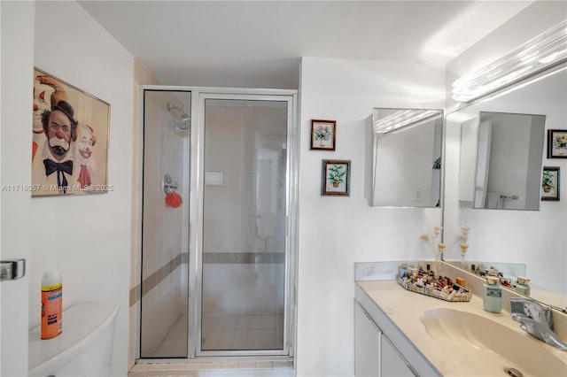 18151 NE 31st Ct Unit 1709, Aventura, FL 33160 - bathroom featuring vanity, a shower stall, and toilet