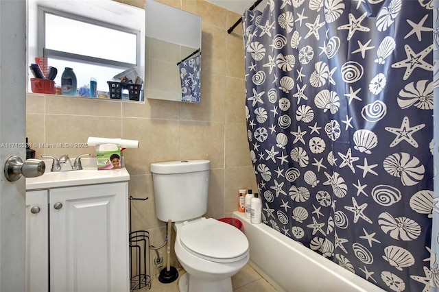 full bathroom featuring shower / bath combo, tasteful backsplash, vanity, tile walls, and toilet