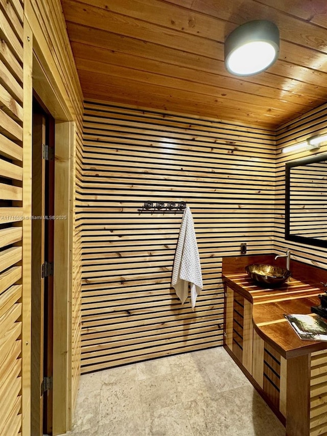 bathroom with wooden ceiling