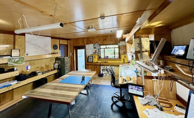 interior space featuring wooden walls