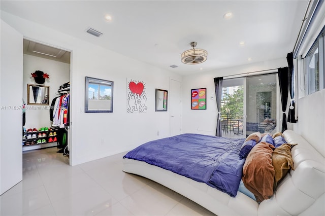 2943 SW 23rd St, Miami, FL 33145 - tiled bedroom featuring attic access, visible vents, recessed lighting, and access to exterior