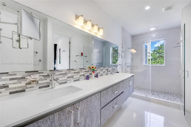 2943 SW 23rd St, Miami, FL 33145 - bathroom featuring a shower stall, tasteful backsplash, a sink, and visible vents