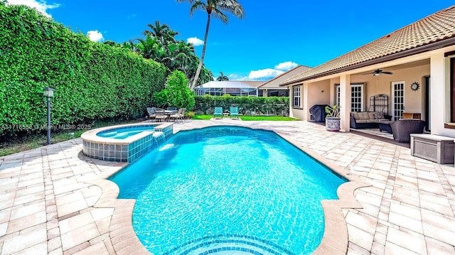 view of pool with an in ground hot tub, an outdoor hangout area, ceiling fan, grilling area, and a patio