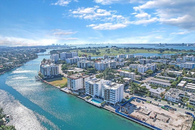 drone / aerial view with a water view