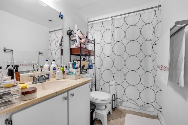 full bath featuring shower / bathtub combination with curtain, tile patterned floors, vanity, and toilet